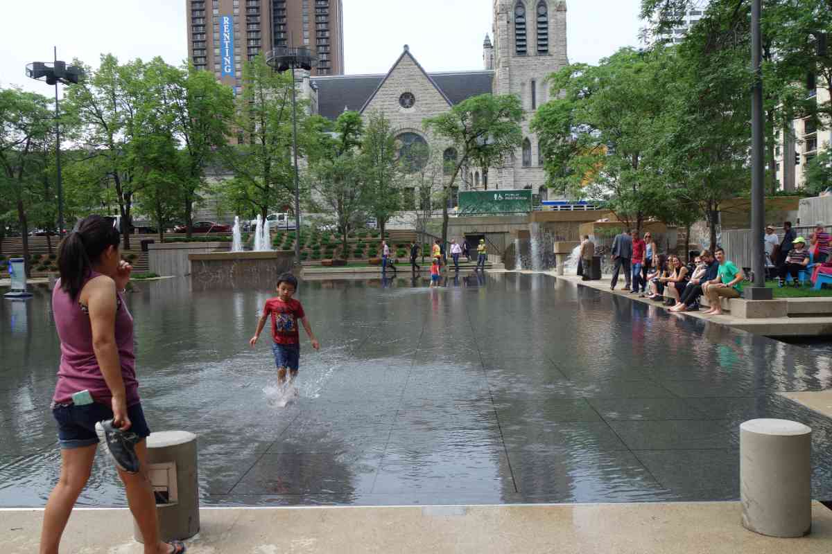 Child-enjoying-the-pool-at-Peavey-Plaza-Photo-Charlene-Roise